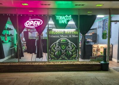 Store front of Melodic Rhythm music & smoke shop.